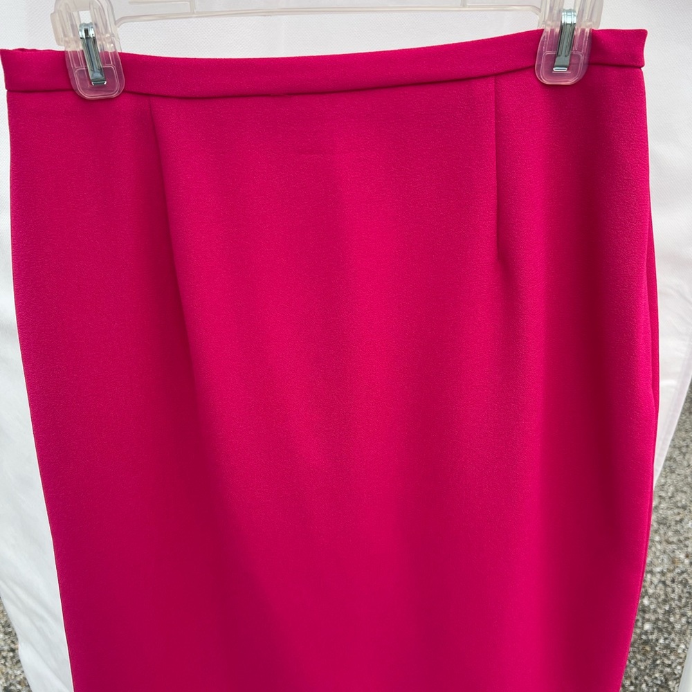 Pink woman's business suit